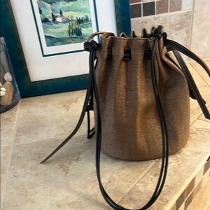 Anita Bilardi rigid bucket bag, leather and coated raffia